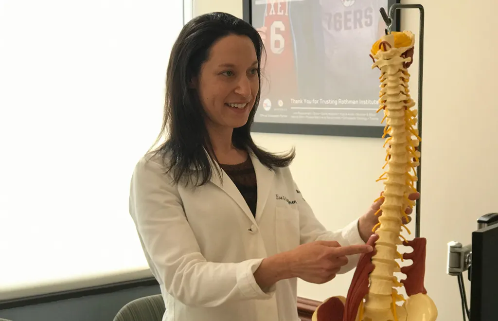 Woman experiencing neck pain